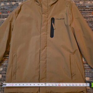 Men's Hollister All Weather Winter coat W/ Faux Fur lining.